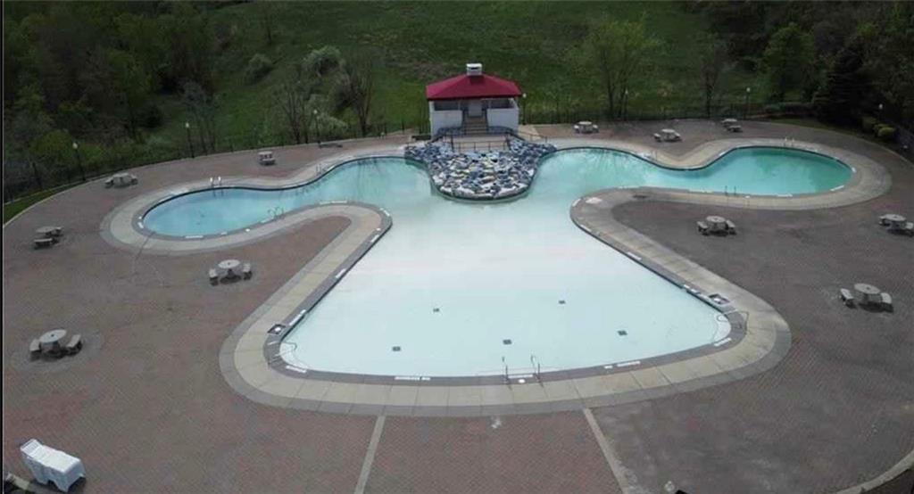 242 Adams Pointe Boulevard, Unit 3 Mars, PA 16046 - Photo 18 of 19 an aerial view of a swimming pool and outdoor space
