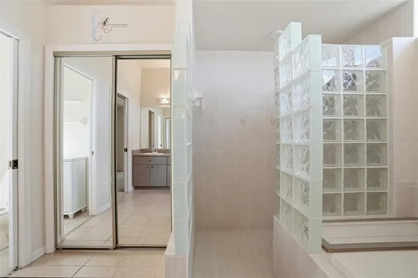a view of a bathroom with a glass door