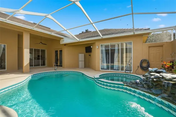 a front view of a house with swimming pool