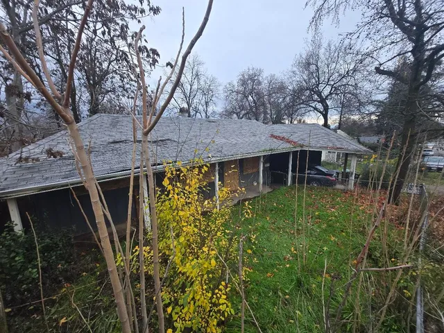 a utility room with sink dryer and washer