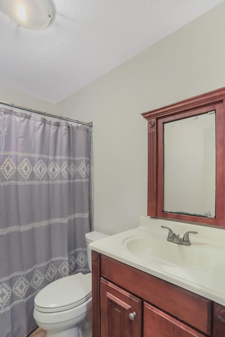 2380 Windsor Road Decatur, IL 62521 - Photo 11 of 27 a bathroom with a sink a toilet and shower