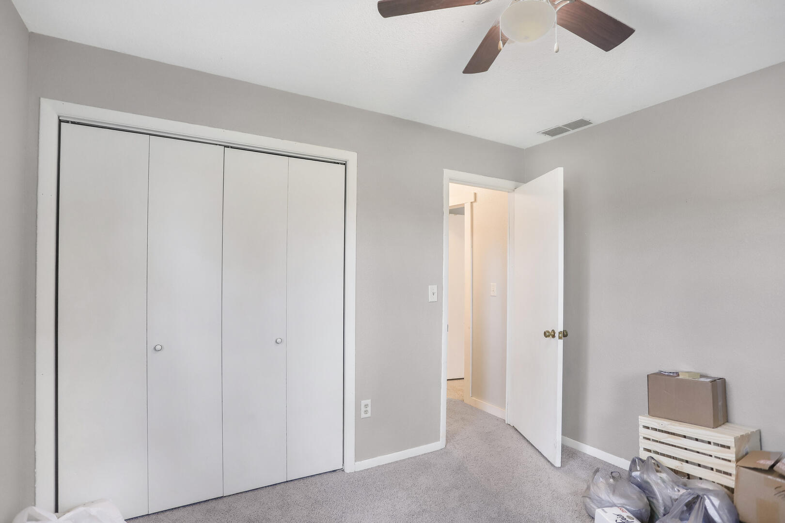 2380 Windsor Road Decatur, IL 62521 - Photo 17 of 27 a view of room with window and wooden floor
