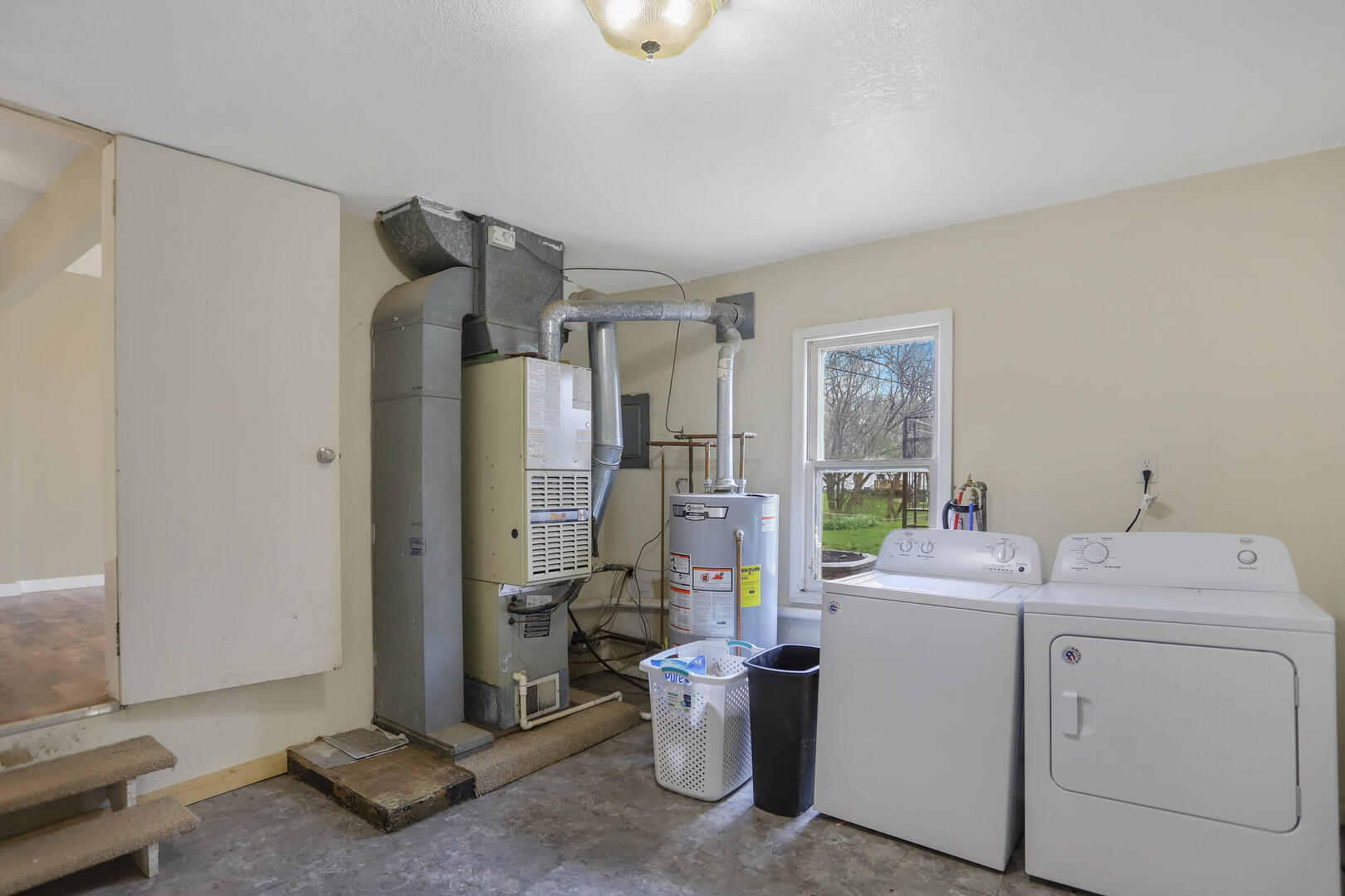 2380 Windsor Road Decatur, IL 62521 - Photo 20 of 27 a room with storage and utility