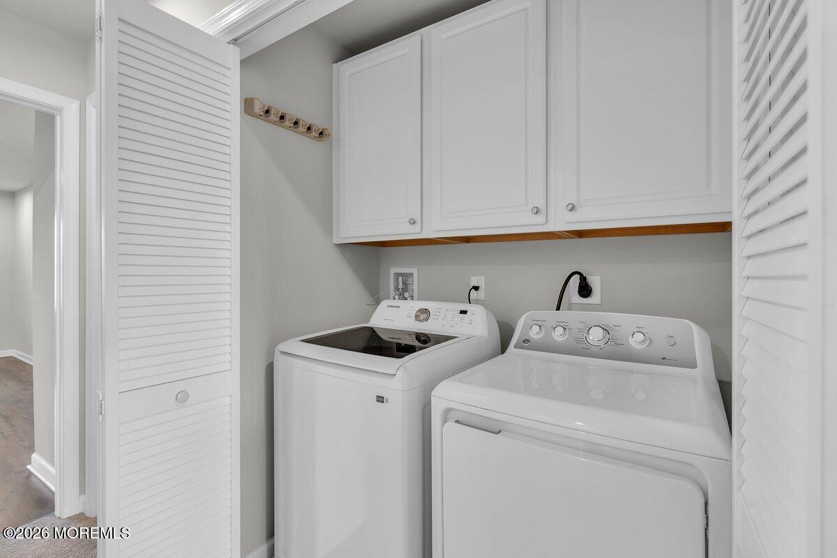 411 Sammy Street Swedesboro, NJ 08085 - Photo 13 of 24 a utility room with dryer and washer