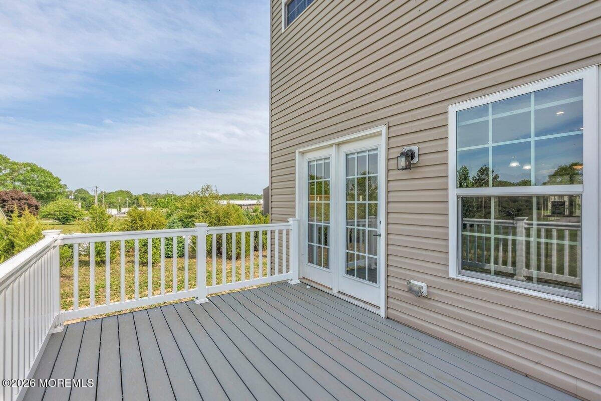 411 Sammy Street Swedesboro, NJ 08085 - Photo 21 of 24 a view of a deck with wooden floor and fence