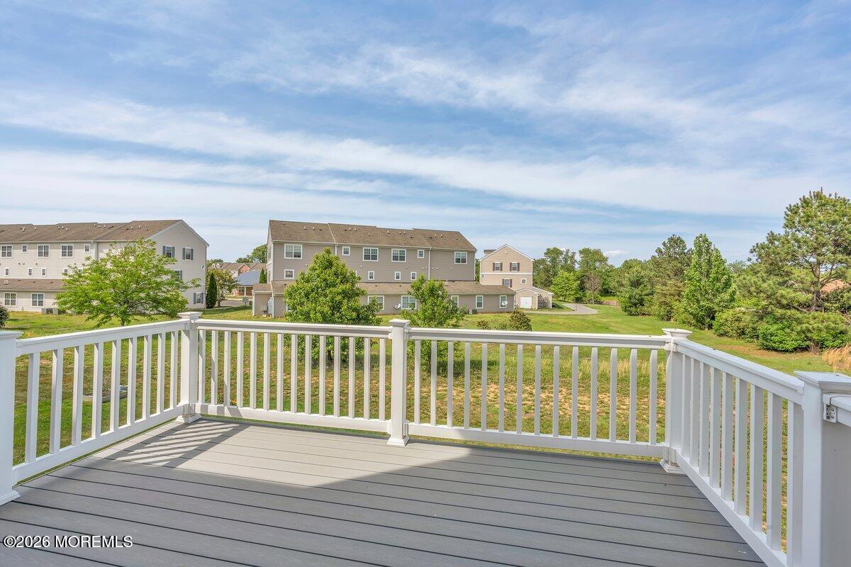 411 Sammy Street Swedesboro, NJ 08085 - Photo 22 of 24 a view of balcony with wooden floor and city view