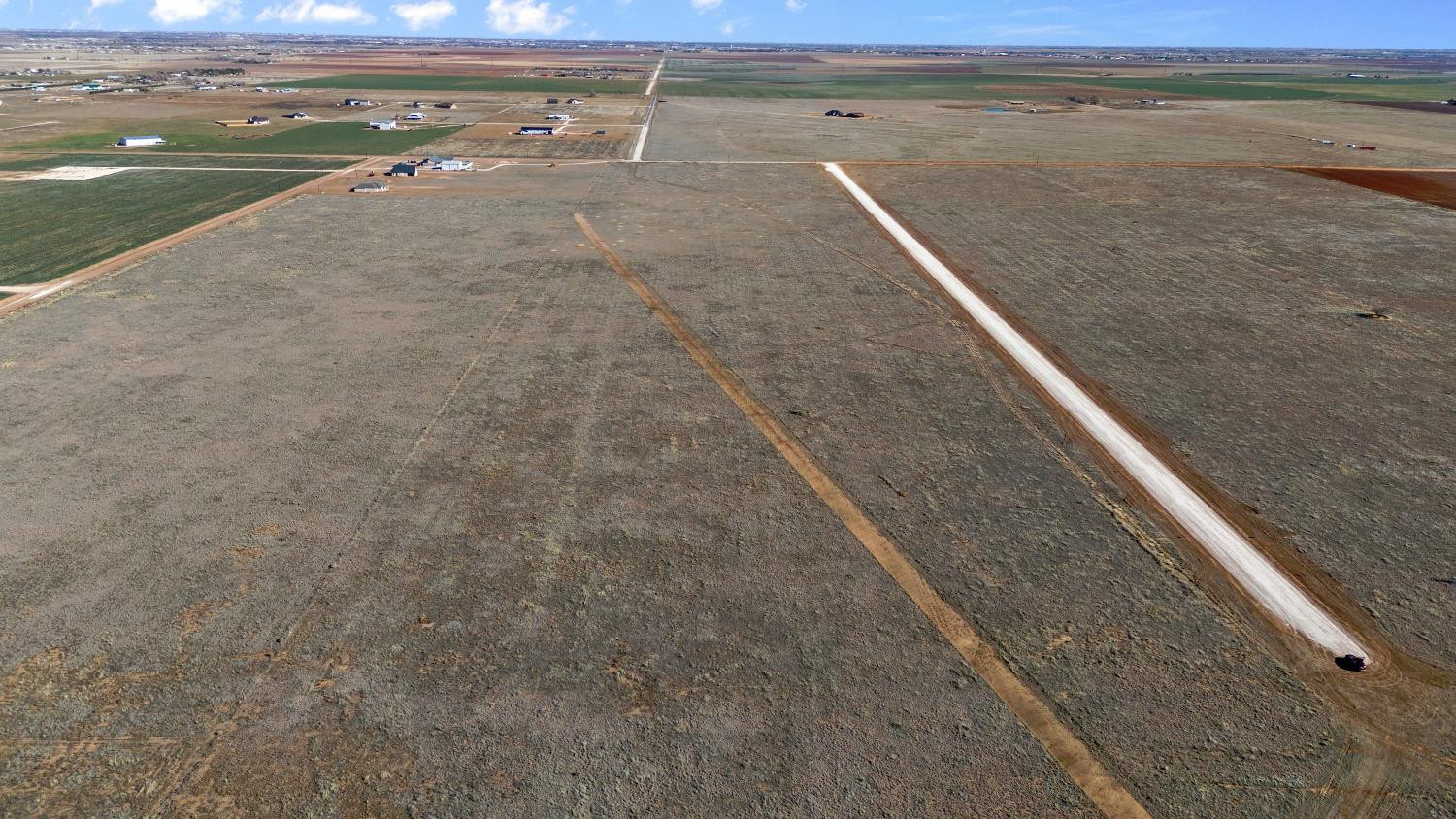6857 Brody Road Lubbock, TX 79407 - Photo 6 of 9 a view of a bathroom with a lake view