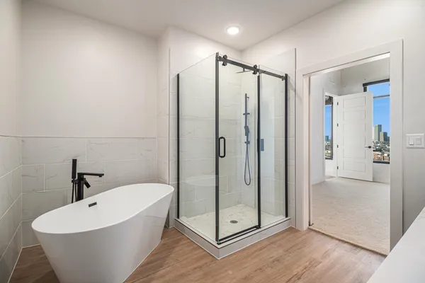 a view of a living room with chairs