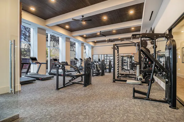 a view of a chairs and table in a patio