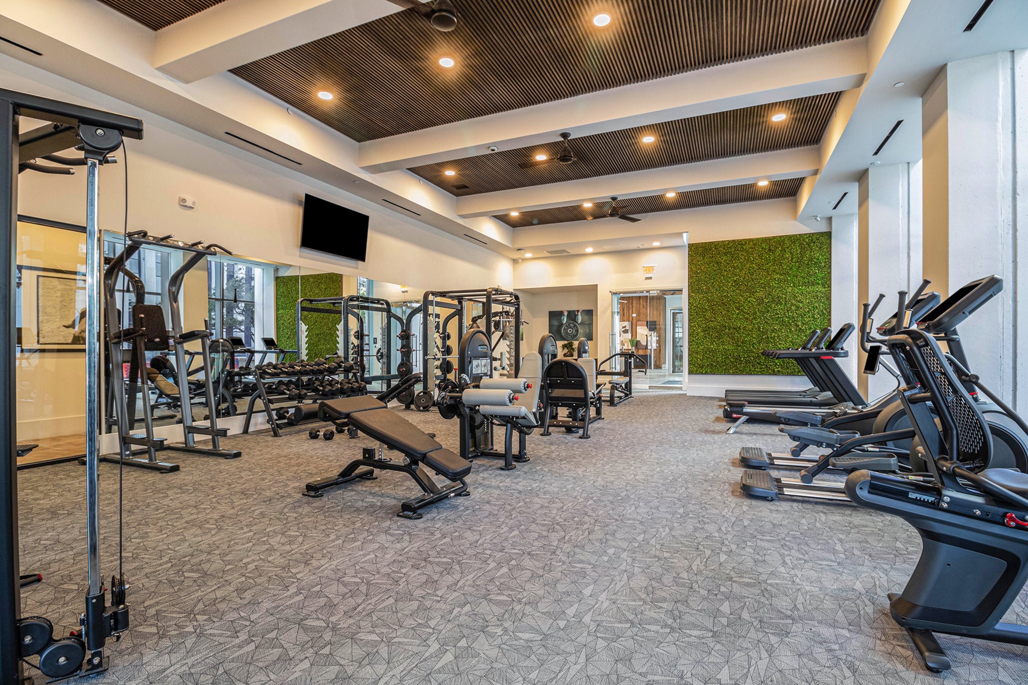1801 Smith Street, Unit 1814 Houston, TX 77002 - Photo 21 of 24 a view of a room with gym equipment