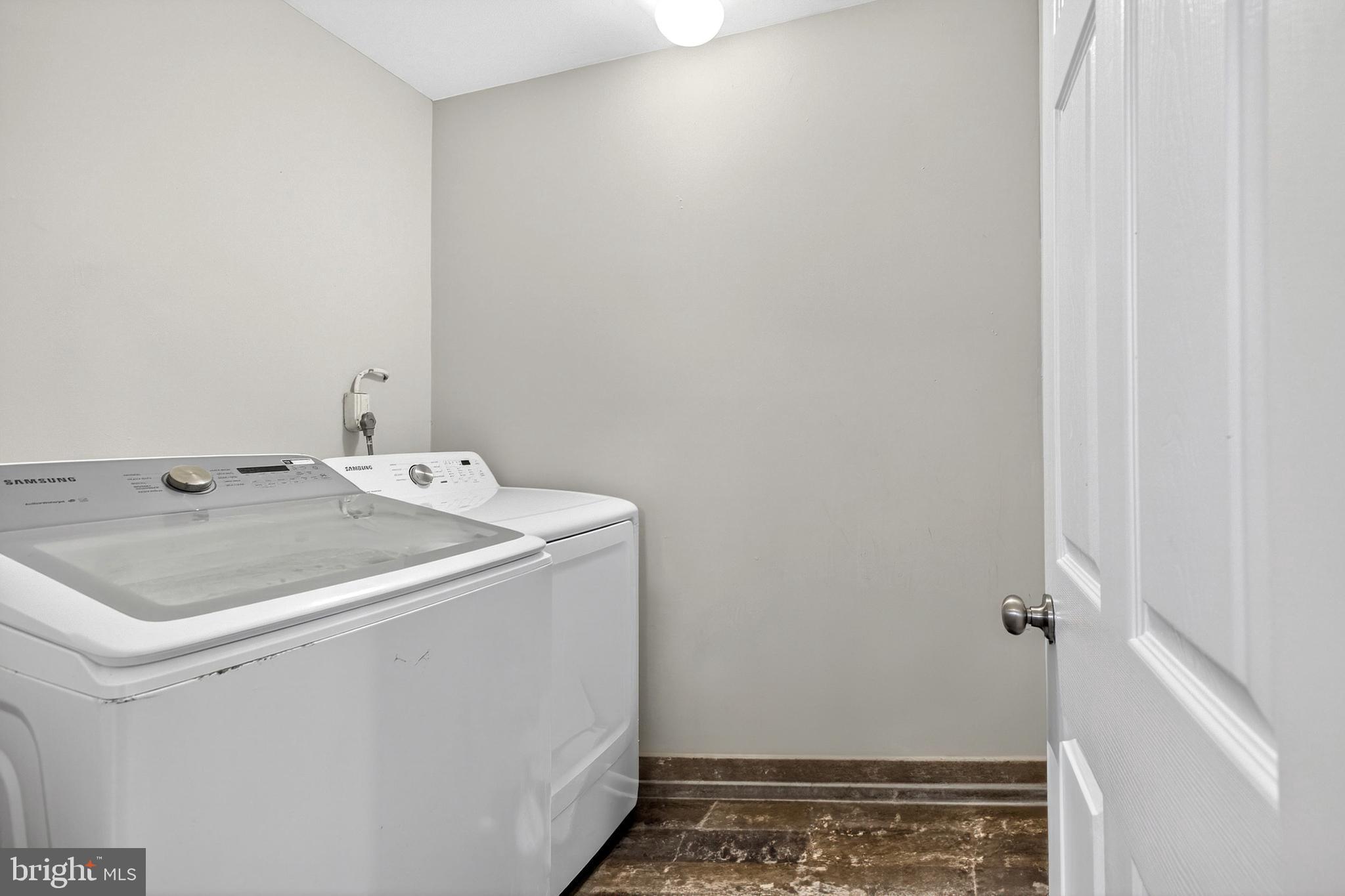 7 Gull Turn Newark, DE 19702 - Photo 16 of 29 a utility room with dryer and washer