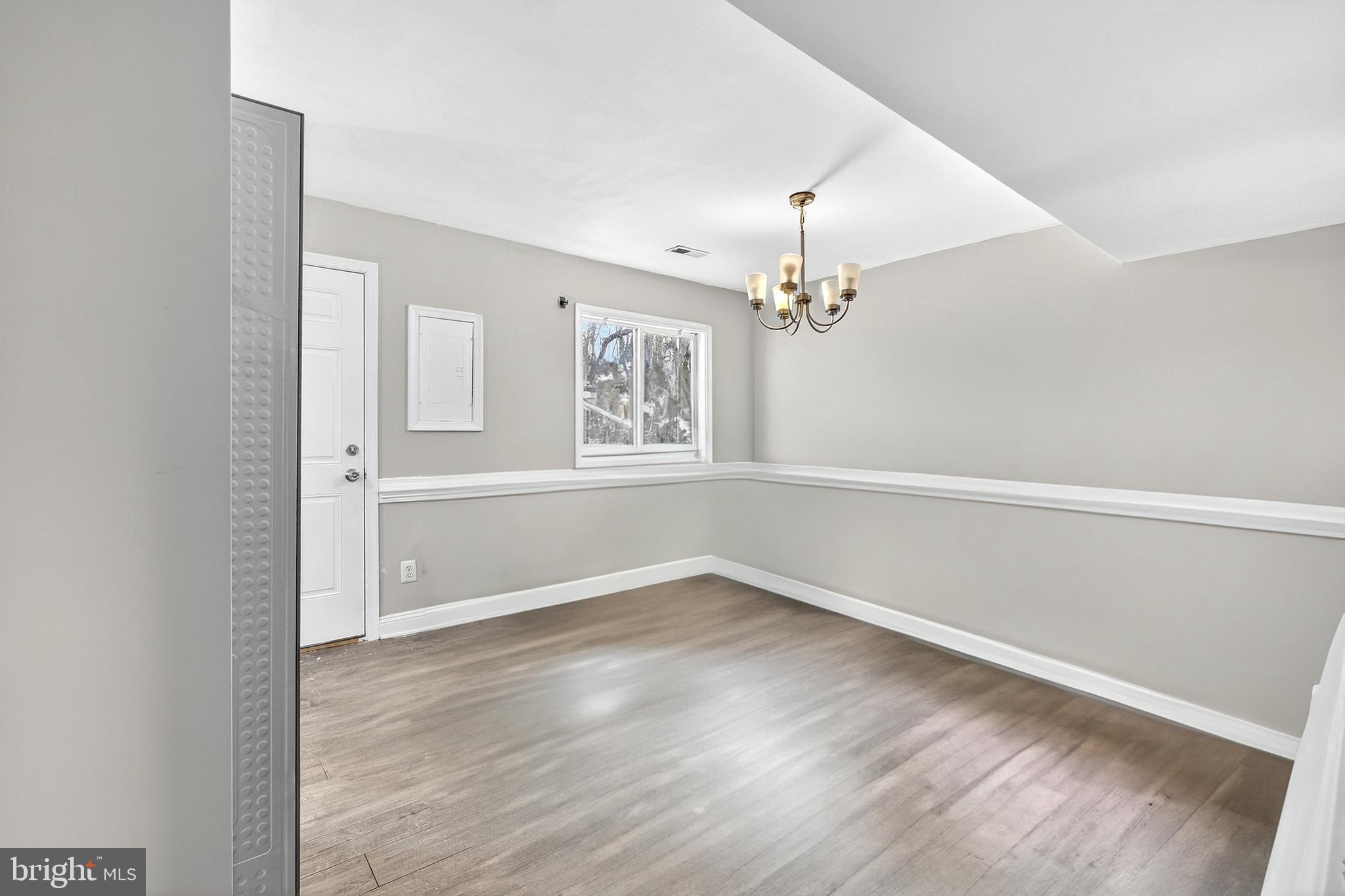 7 Gull Turn Newark, DE 19702 - Photo 19 of 29 wooden floor in an empty room with a window