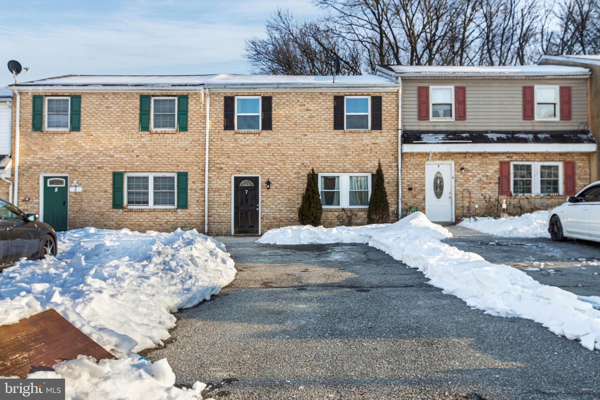 7 Gull Turn Newark, DE 19702 - Photo 2 of 29 a front view of a house with a yard