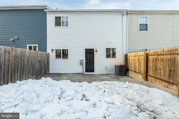 a view of a backyard with a house