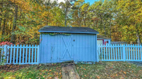 a view of a wooden fence