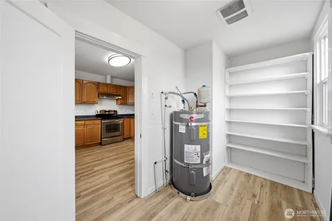 a kitchen with stainless steel appliances a stove and a refrigerator