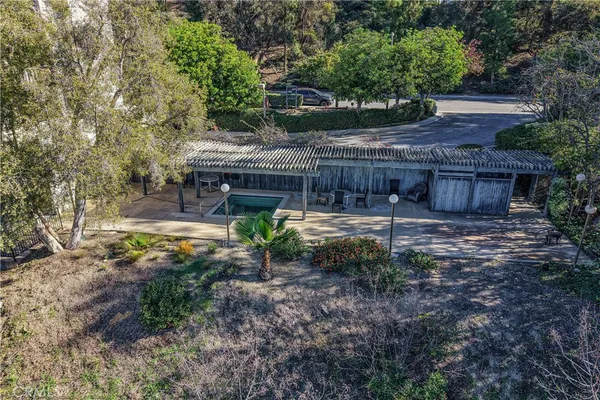 an aerial view of multiple house with yard