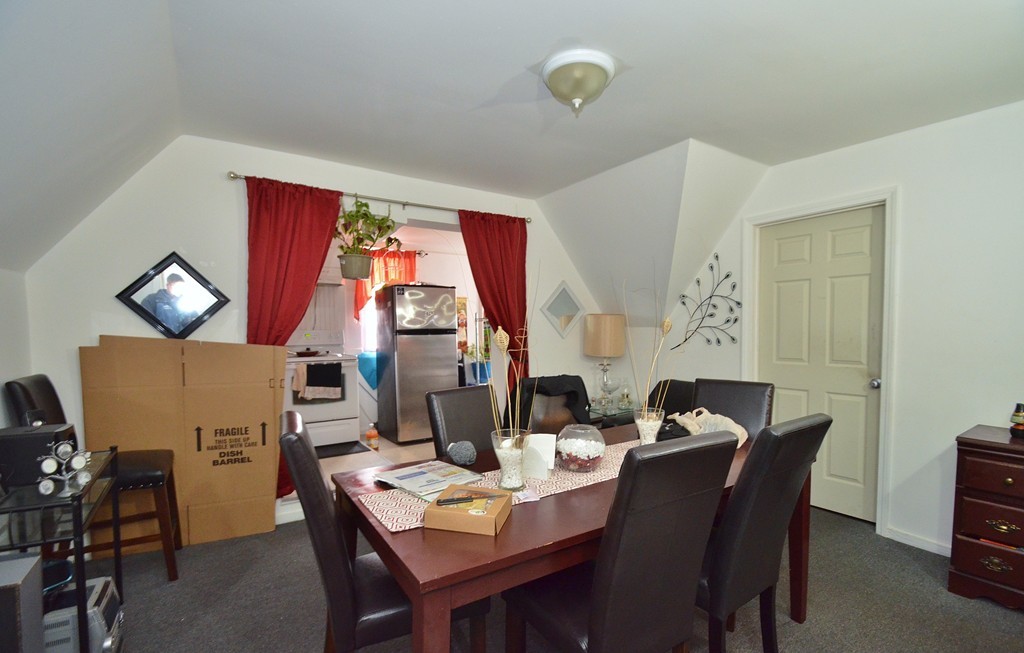 25 Ripley Street Worcester, MA 01610 - Photo 15 of 17 a view of a dining room with furniture window and outside view