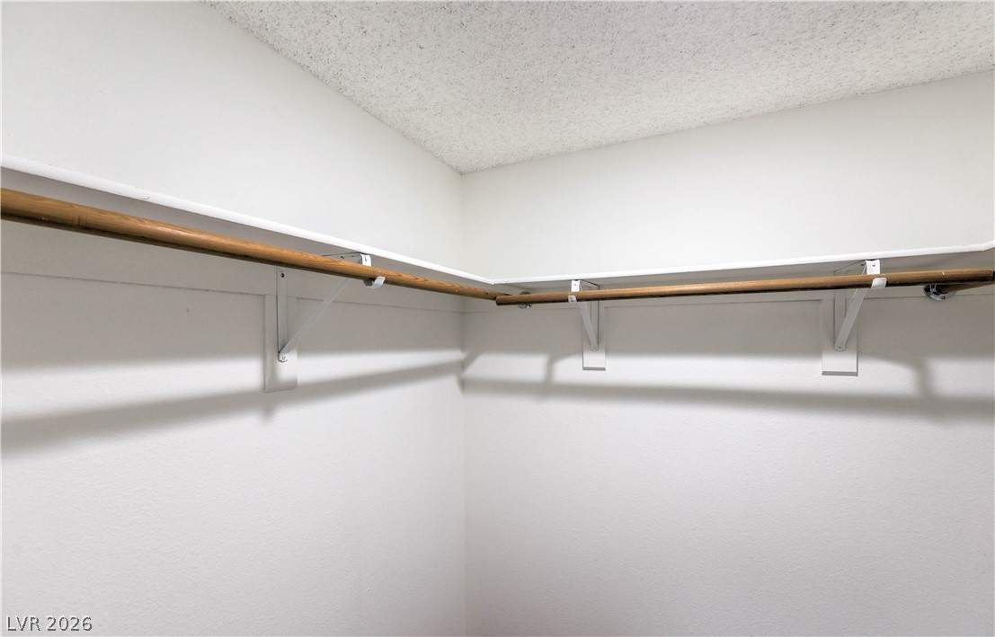 1575 West Warm Springs Road, Unit 322 Henderson, NV 89014 - Photo 17 of 25 Functional closet space provides ample storage for wardrobe essentials.