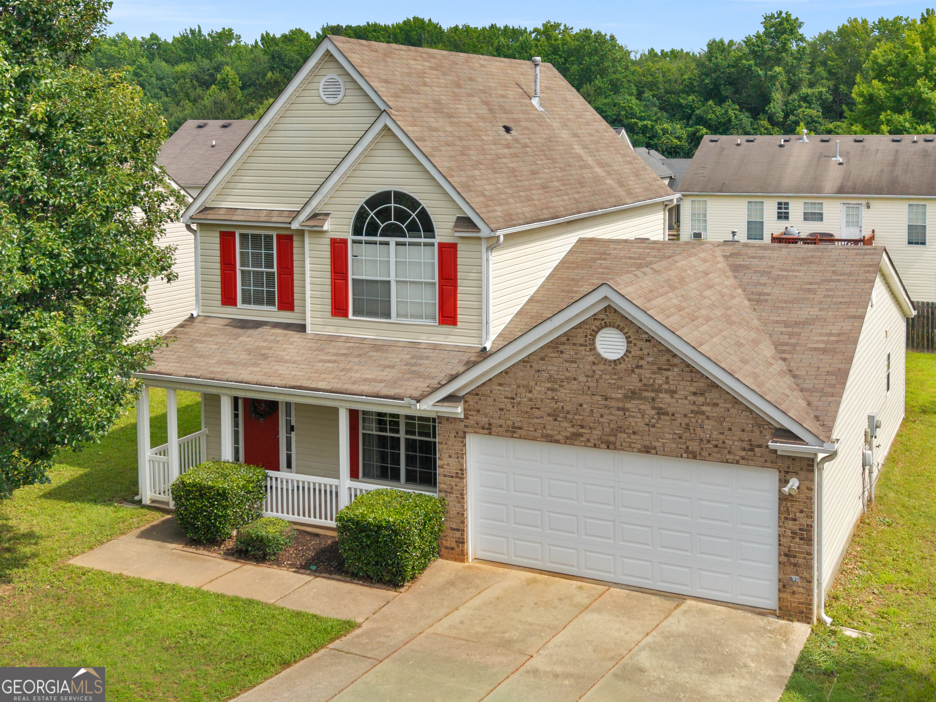 3370 Waggoner Place Rex, GA 30273 - Photo 2 of 25 a view of multiple houses with a yard