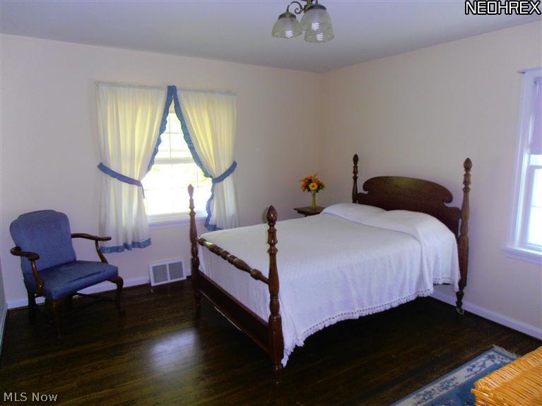 1596 Brainard Road Lyndhurst, OH 44124 - Photo 9 of 15 Master suite with rich hardwood flooring