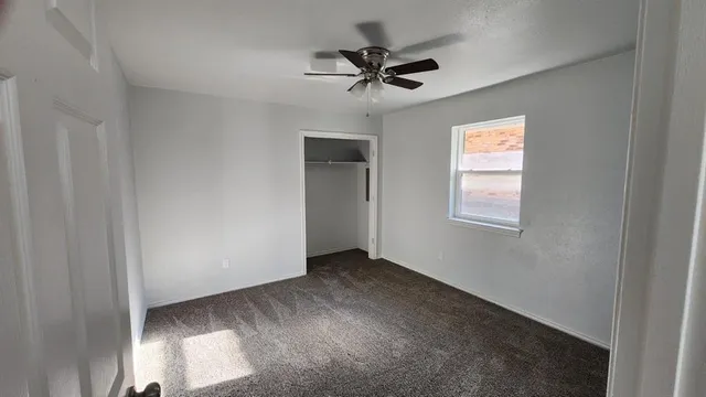 a view of a livingroom with a window