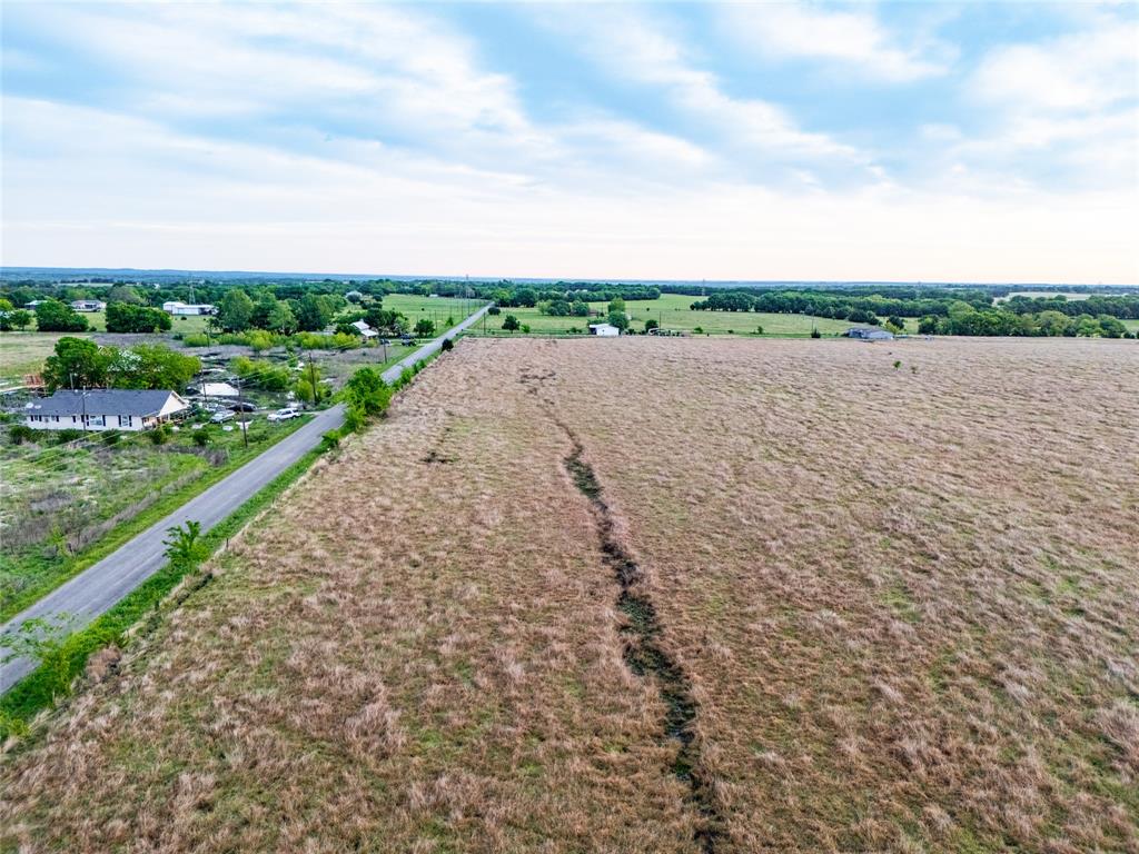 950 Old Ida Road Sherman, TX 75090 - Photo 10 of 15 a view of a lake with a big yard