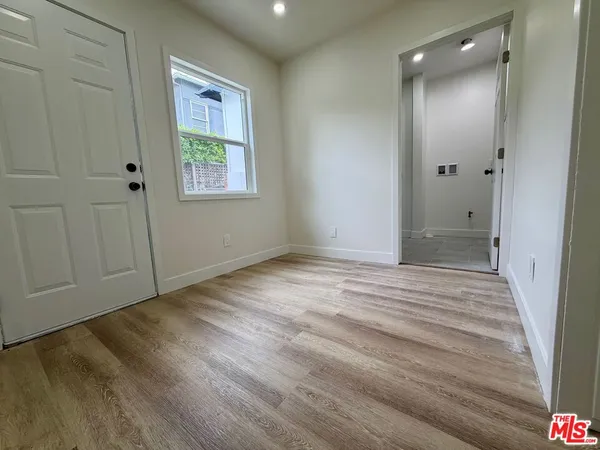 wooden floor and windows in a room