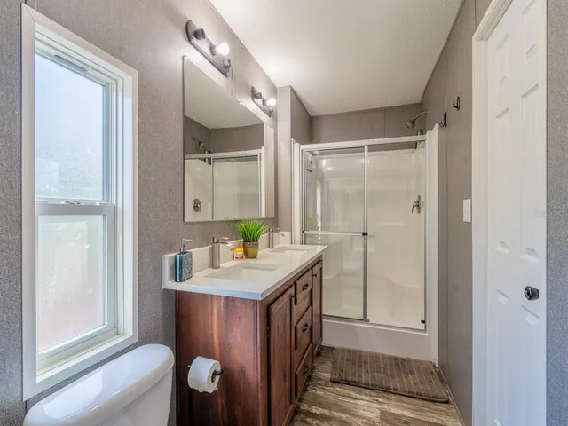a close view of a utility room with washer and dryer