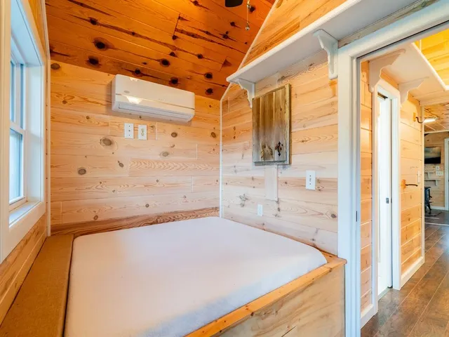 a kitchen with stainless steel appliances granite countertop a refrigerator a sink and a stove