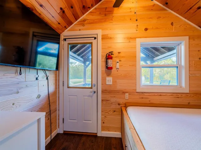 a view of a swimming pool with a patio