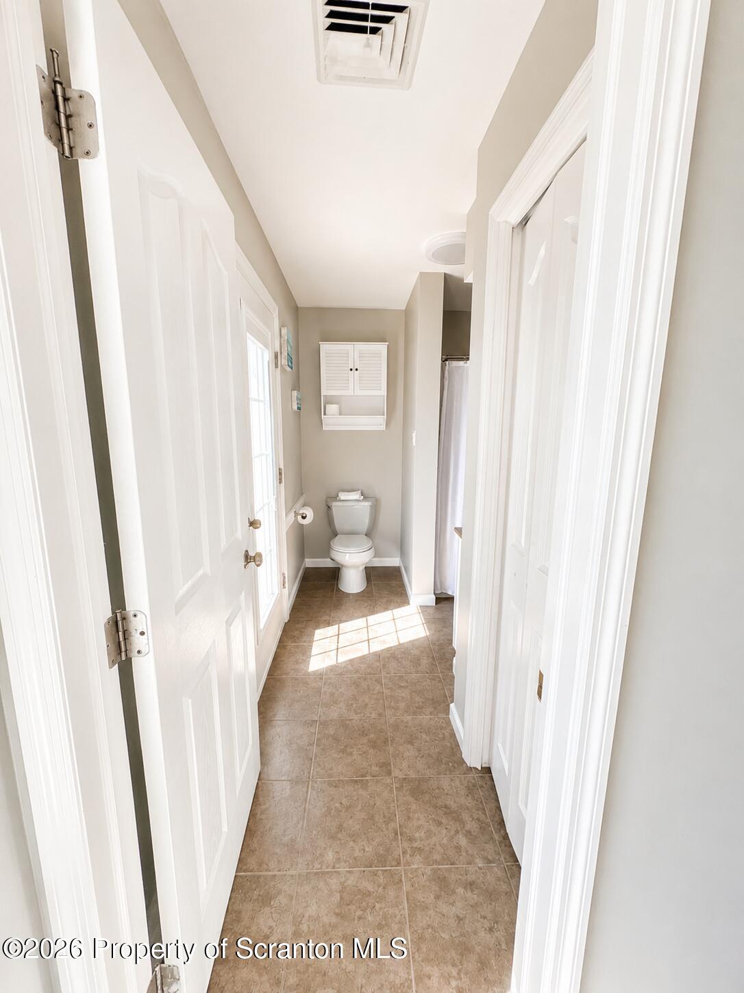155 Baylor Road Nicholson, PA 18446 - Photo 41 of 53 a view of a hallway with wooden floor and staircase