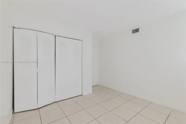 a view of an empty room with window