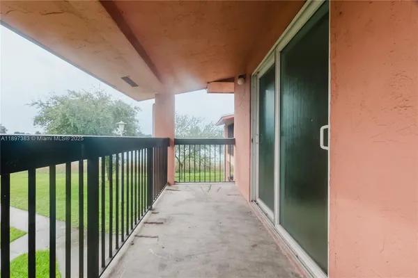 an empty room with a bench