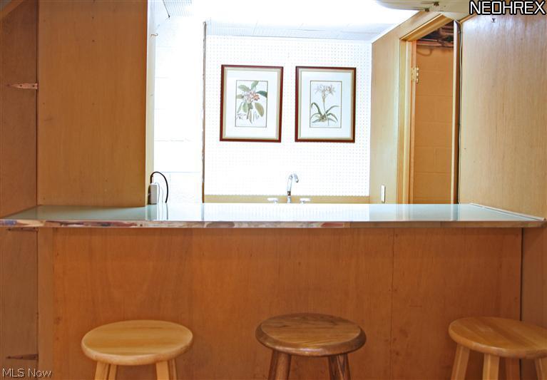 184 Overwood Road Akron, OH 44313 - Photo 21 of 24 This cozy little wet bar is in the lower level rec room.