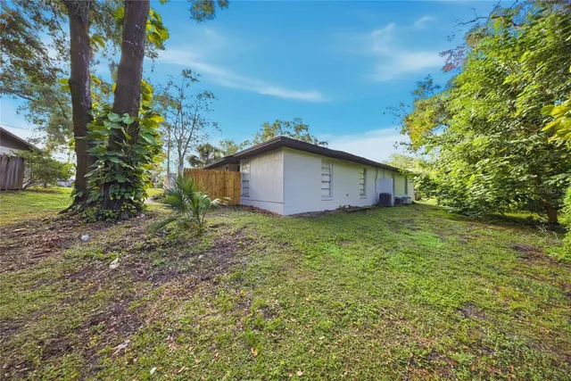 a view of a house with a garden