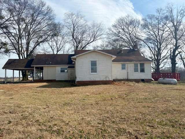 2245 Cheek Pulliam Road Royston, GA 30662 - Photo 14 of 17 a house with yard in front of it