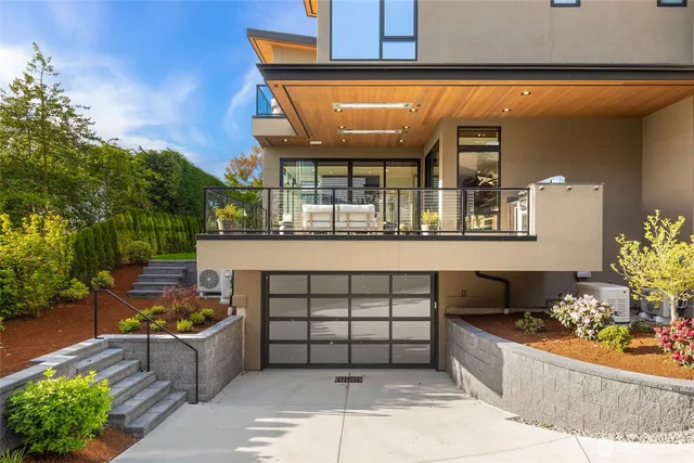 a view of a porch with a table and chairs