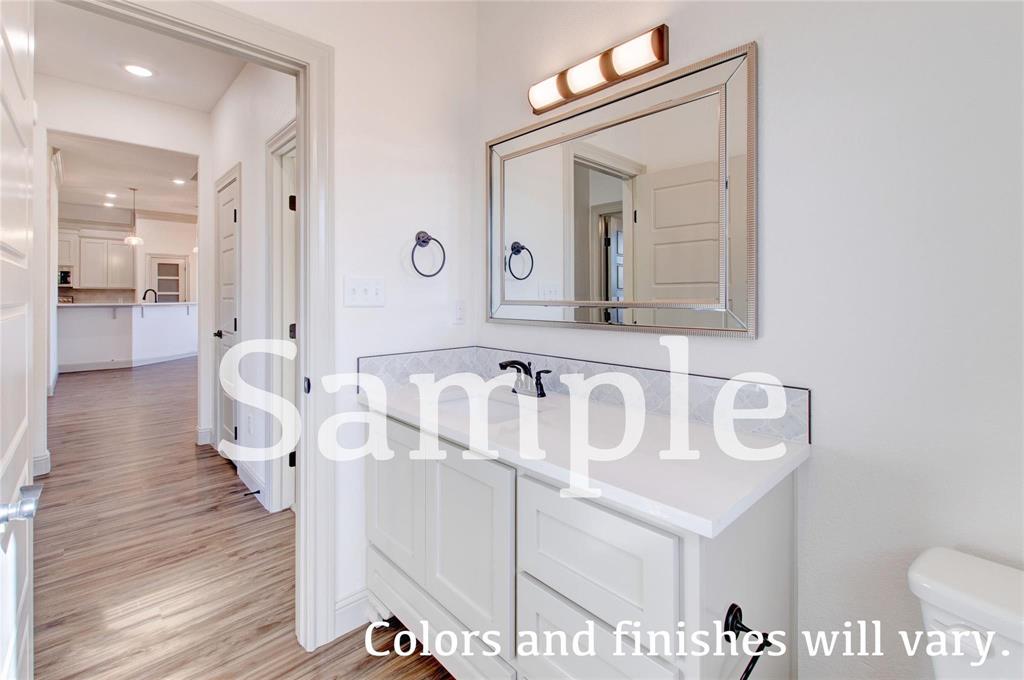 7648 Mountain View Road Abilene, TX 79602 - Photo 17 of 21 a view of a hallway with wooden floor and staircase