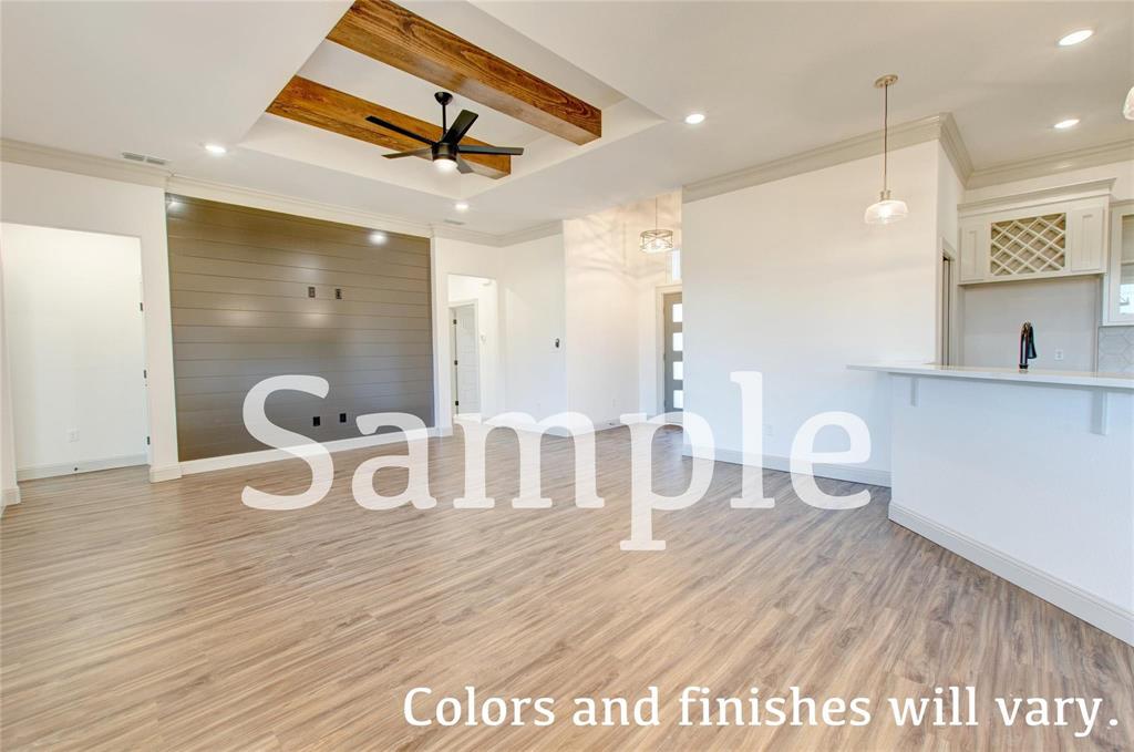 7648 Mountain View Road Abilene, TX 79602 - Photo 2 of 21 a bathroom with a double vanity sink a toilet and a shower