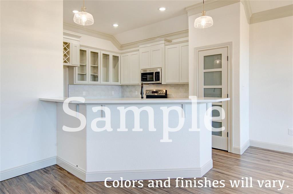 7648 Mountain View Road Abilene, TX 79602 - Photo 6 of 21 a view of kitchen with stainless steel appliances granite countertop white cabinets and window