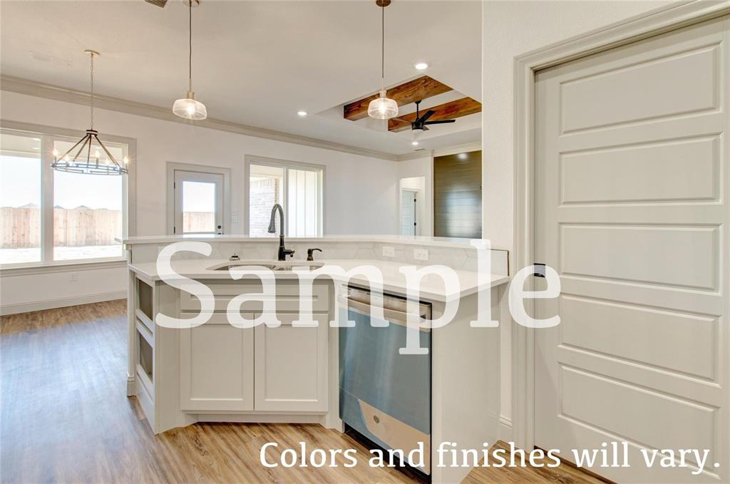 7648 Mountain View Road Abilene, TX 79602 - Photo 7 of 21 a view of a bathroom with a sink and mirror