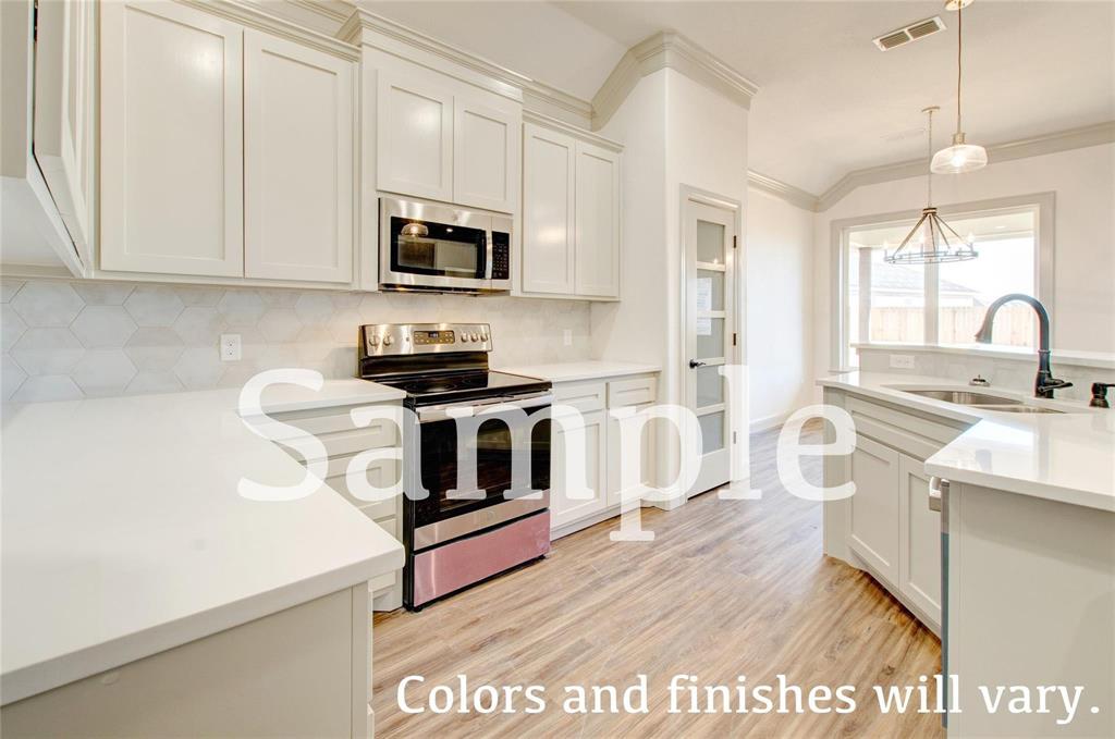 7648 Mountain View Road Abilene, TX 79602 - Photo 9 of 21 a kitchen with stainless steel appliances granite countertop a sink and a stove