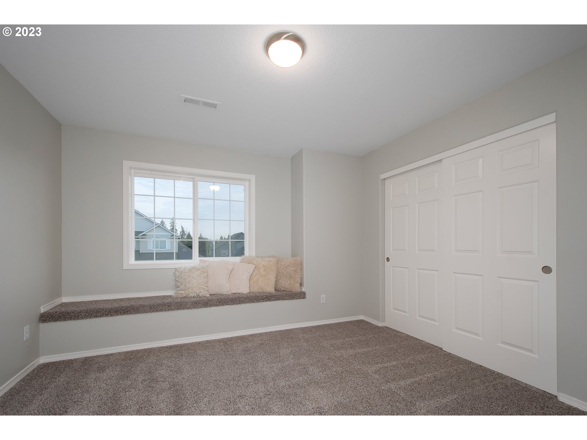 1830 North 8th Way Ridgefield, WA 98642 - Photo 30 of 44 a view of an empty room with a window