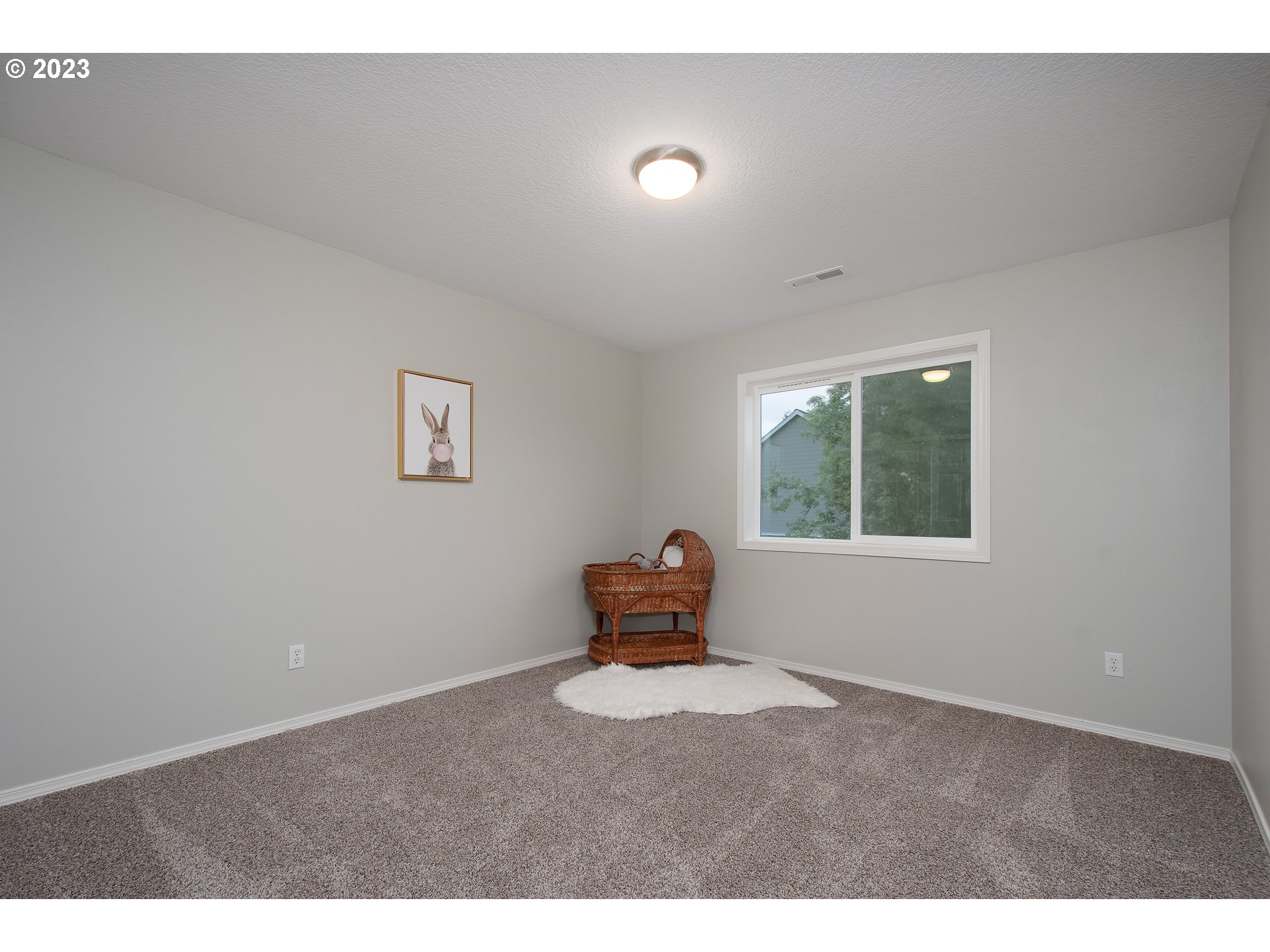 1830 North 8th Way Ridgefield, WA 98642 - Photo 31 of 44 a view of an empty room with a window