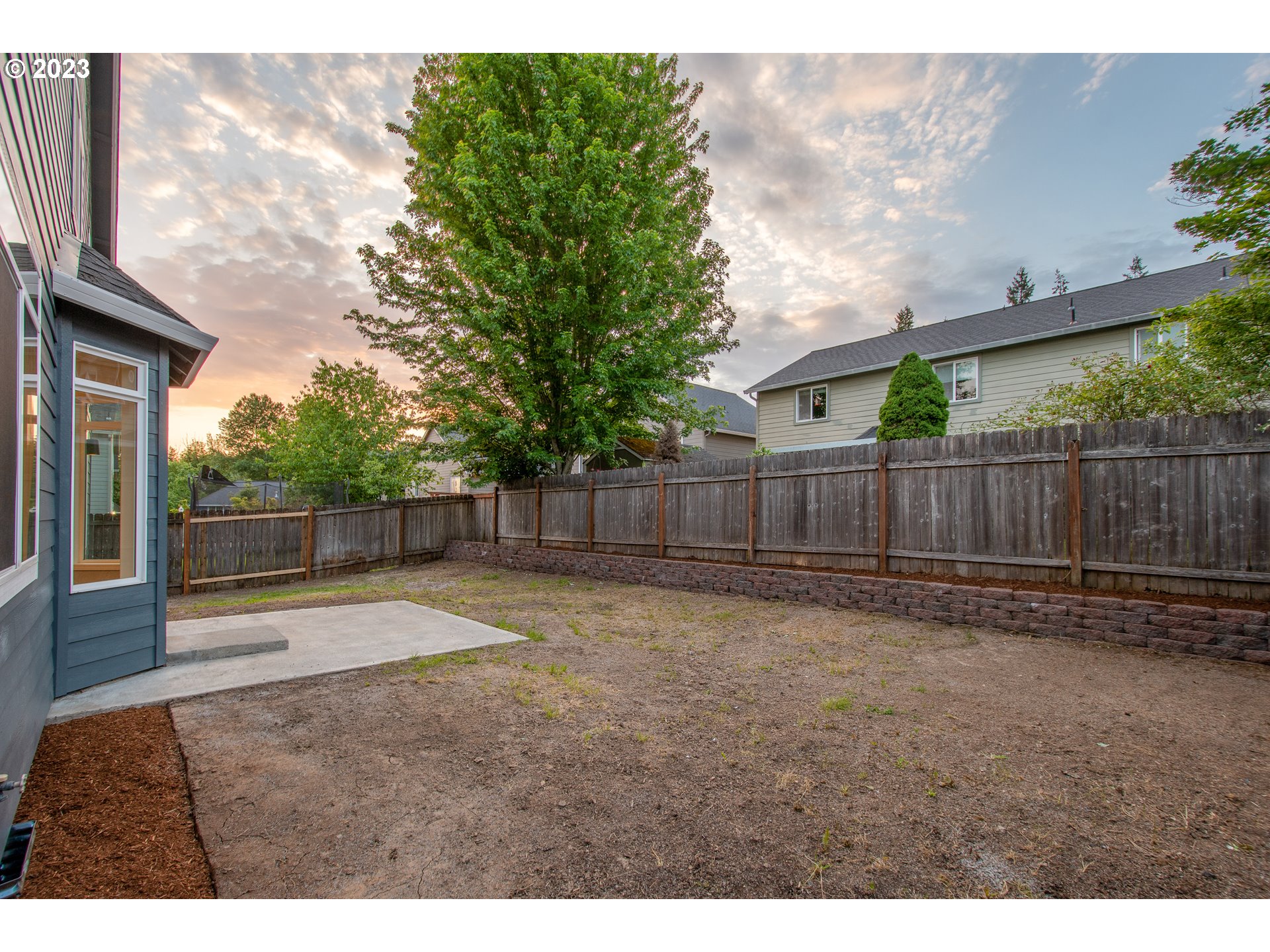 1830 North 8th Way Ridgefield, WA 98642 - Photo 34 of 44 a backyard of a house with lots of green space