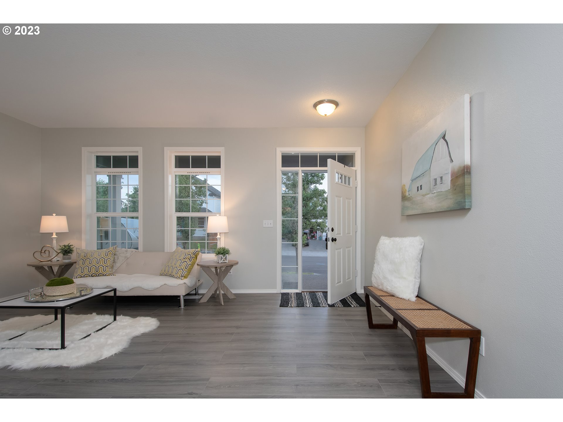 1830 North 8th Way Ridgefield, WA 98642 - Photo 4 of 44 a living room with furniture and wooden floor