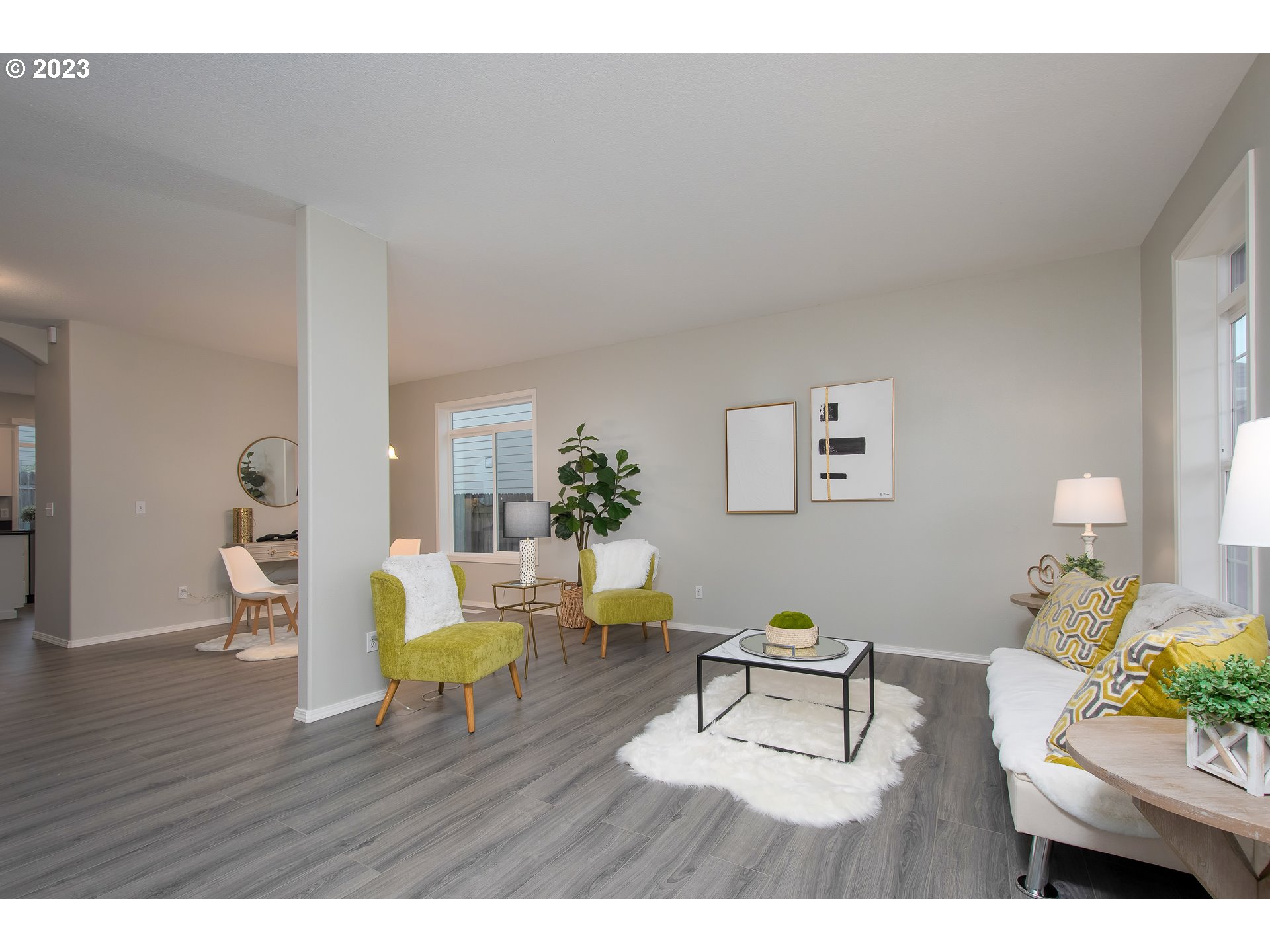 1830 North 8th Way Ridgefield, WA 98642 - Photo 6 of 44 a living room with furniture and wooden floor