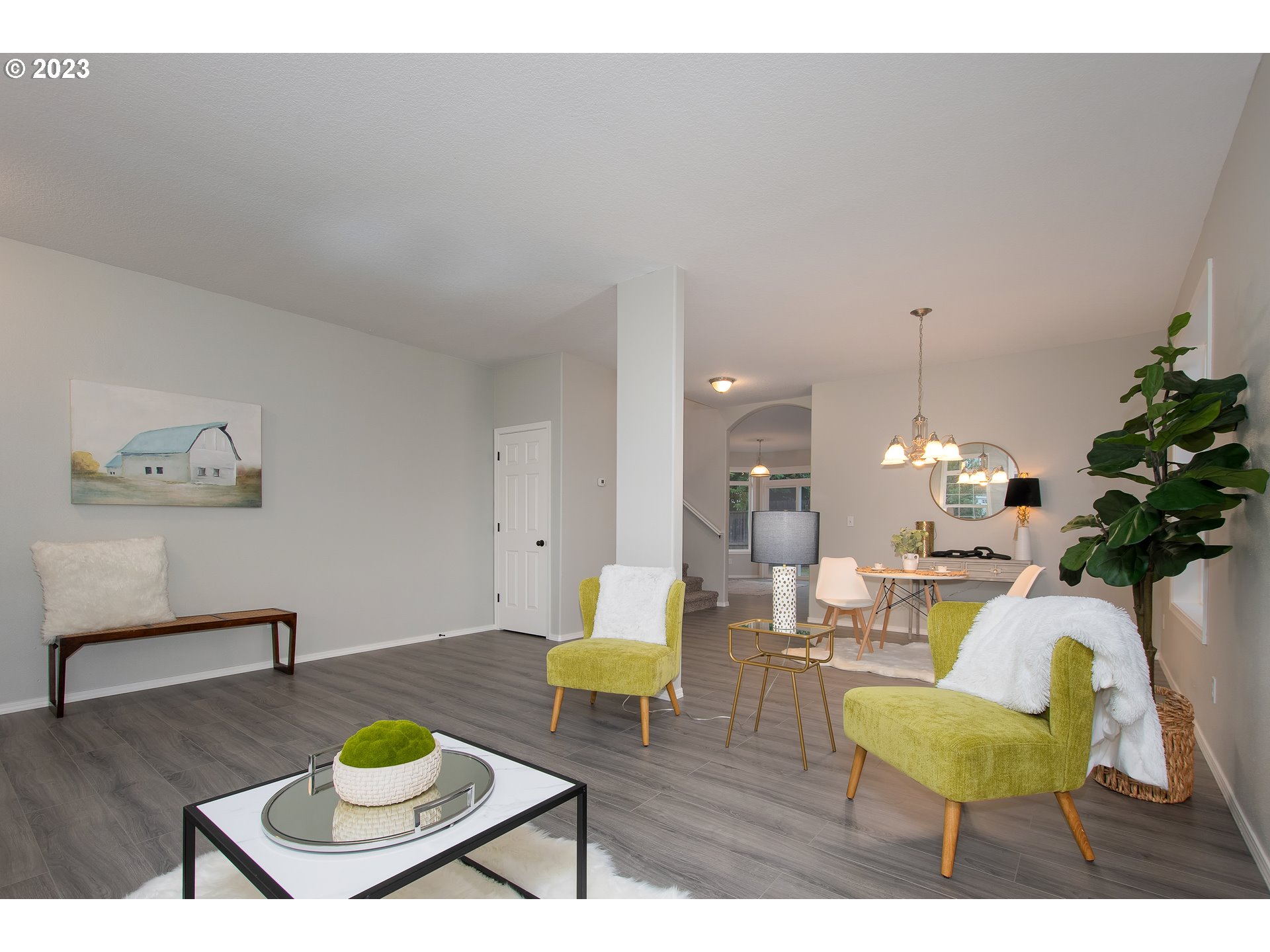 1830 North 8th Way Ridgefield, WA 98642 - Photo 7 of 44 a living room with furniture and a wooden floor