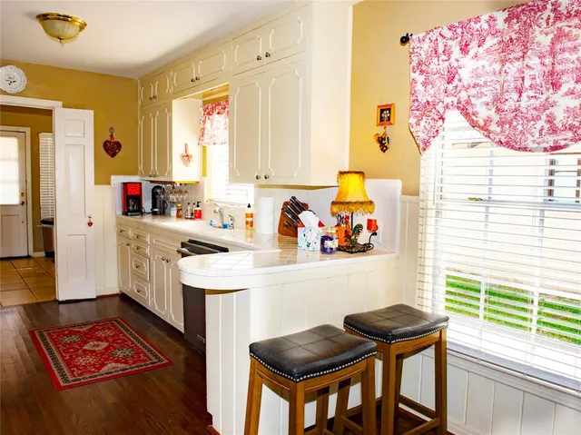 a view of kitchen island with furniture and window